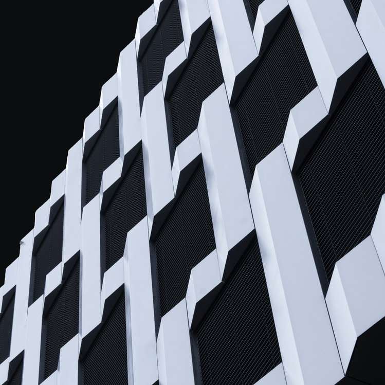white and black building illustration sliding puzzle online