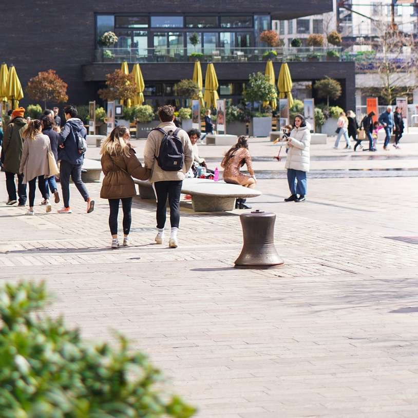 people walking on street during daytime sliding puzzle online