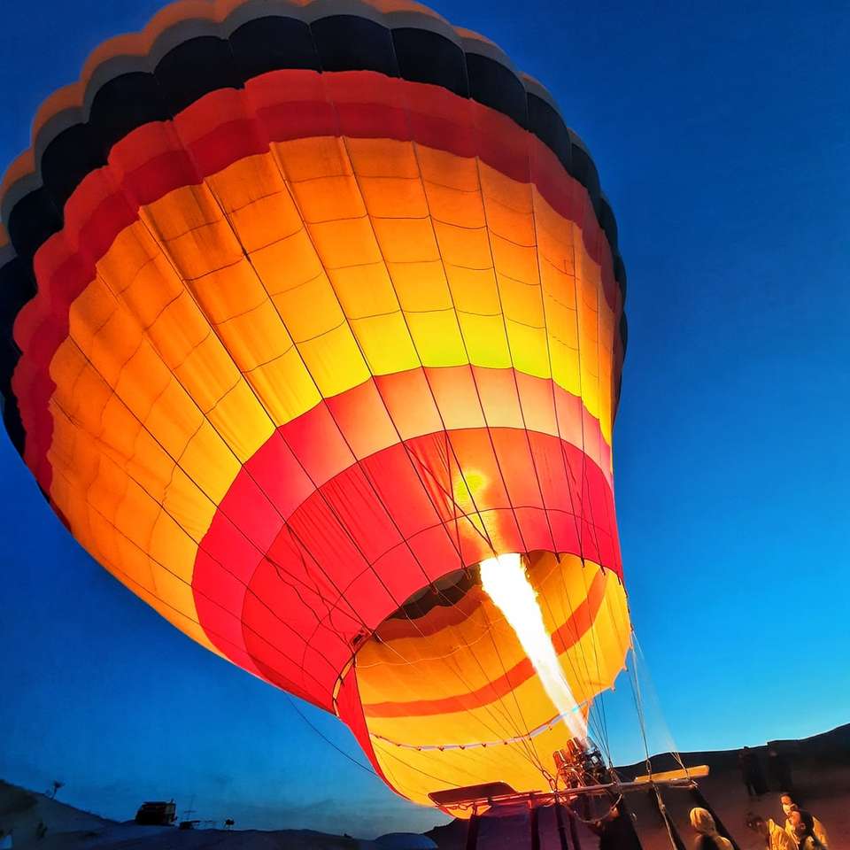 orange hot air balloon during night time online puzzle