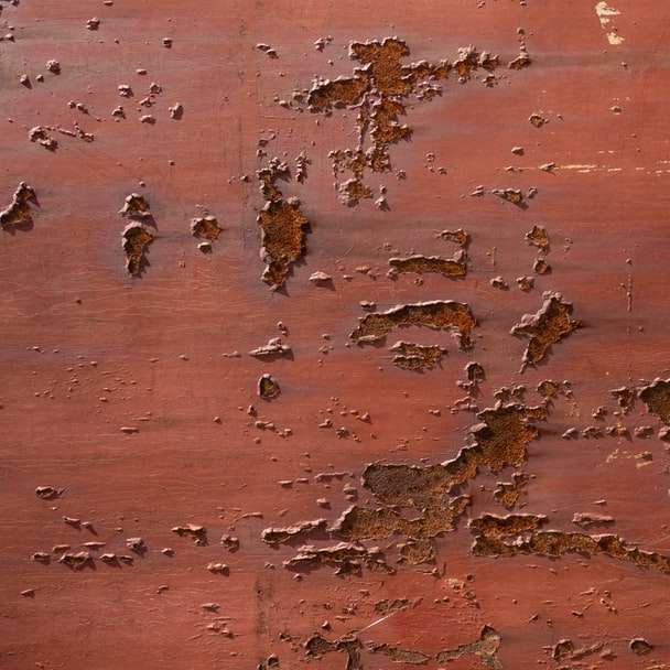 pedras marrons e pretas na areia marrom puzzle deslizante online