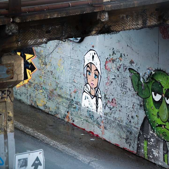 Graffiti de rana verde en la pared rompecabezas en línea