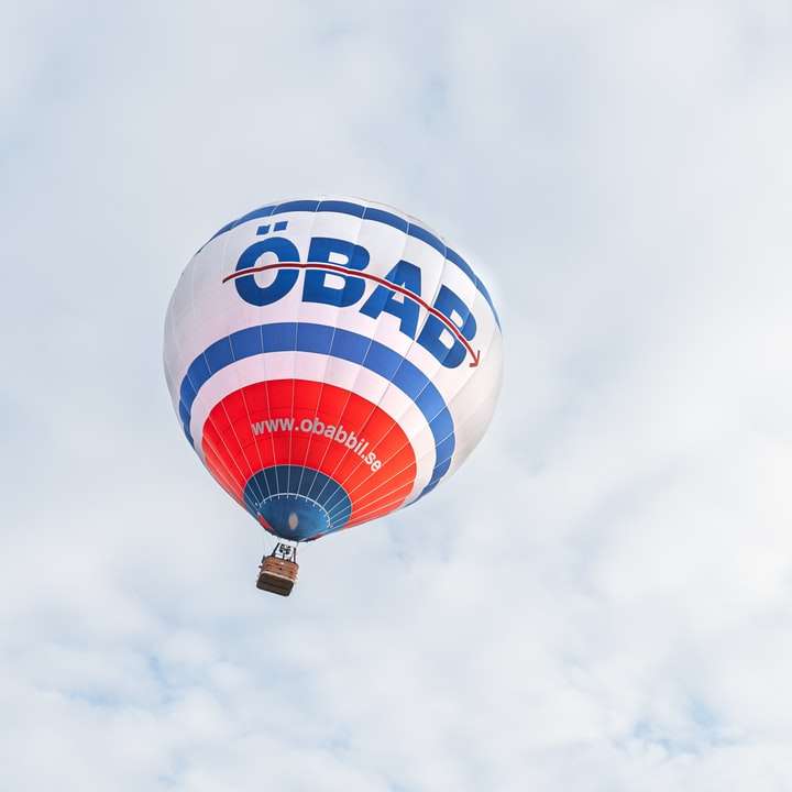 μπλε κόκκινο και άσπρο μπαλόνι ζεστού αέρα συρόμενο παζλ online