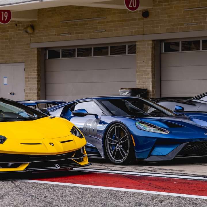 blue and yellow lamborghini aventador parked online puzzle