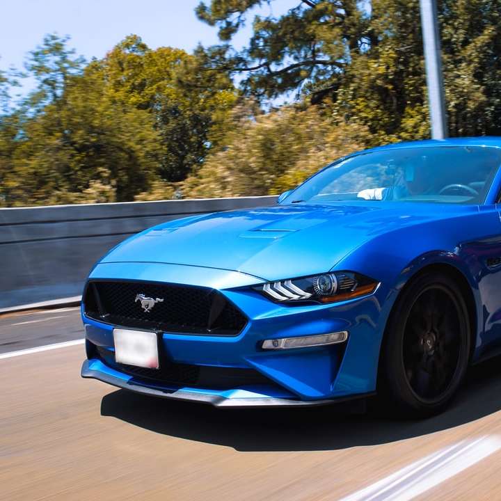 blauwe BMW m 3 coupe op de weg overdag schuifpuzzel online