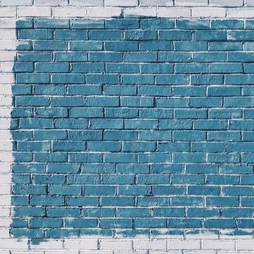 gray concrete bricks painted in blue sliding puzzle online