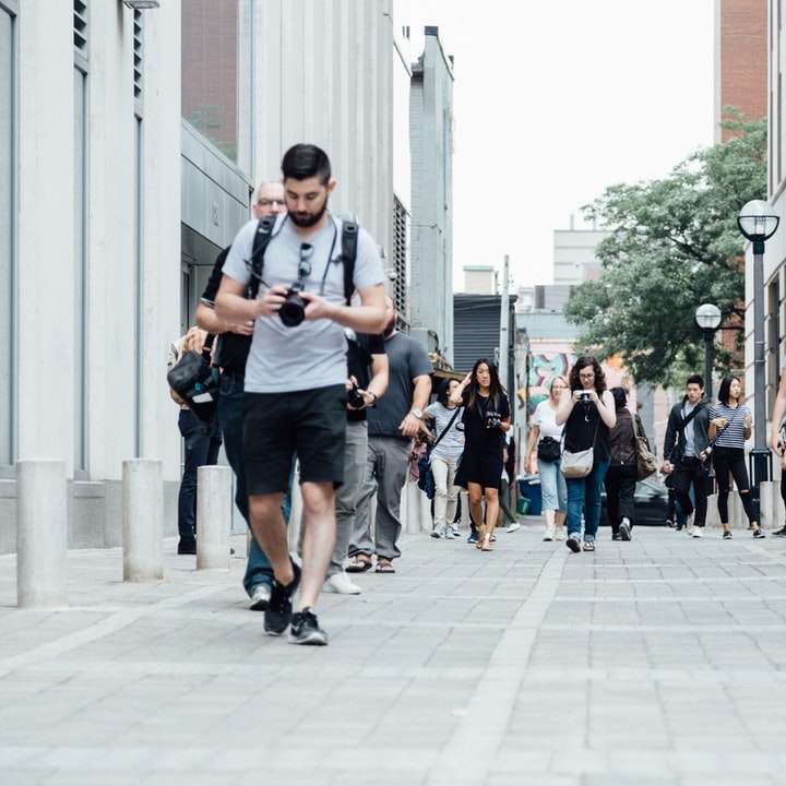 people walking at walkway sliding puzzle online