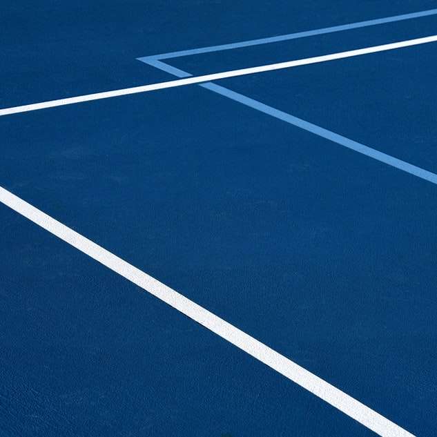 campo de atletismo azul e branco puzzle deslizante online
