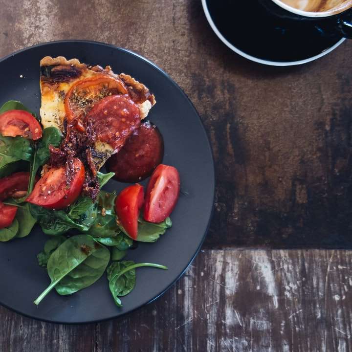 sliced tomato dish on black plate sliding puzzle online