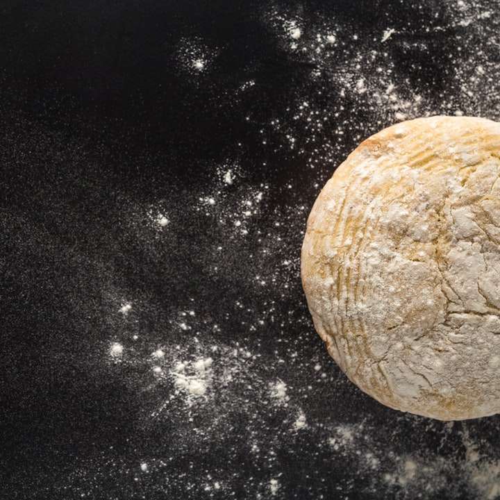 dough on black surface with flour online puzzle