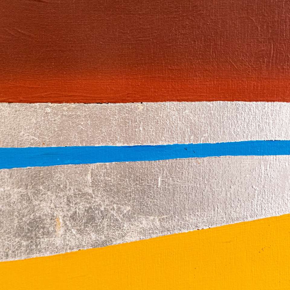 orange and blue striped textile sliding puzzle online
