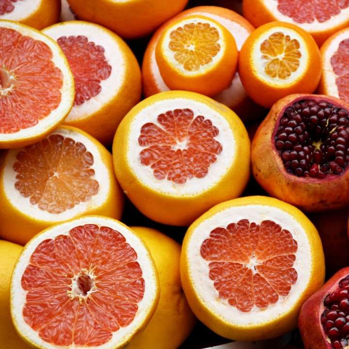 Frutas de romã e laranja puzzle online