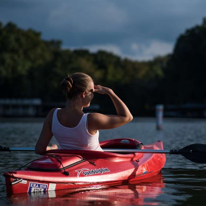 woman looking at the trees while riding on kayak online puzzle