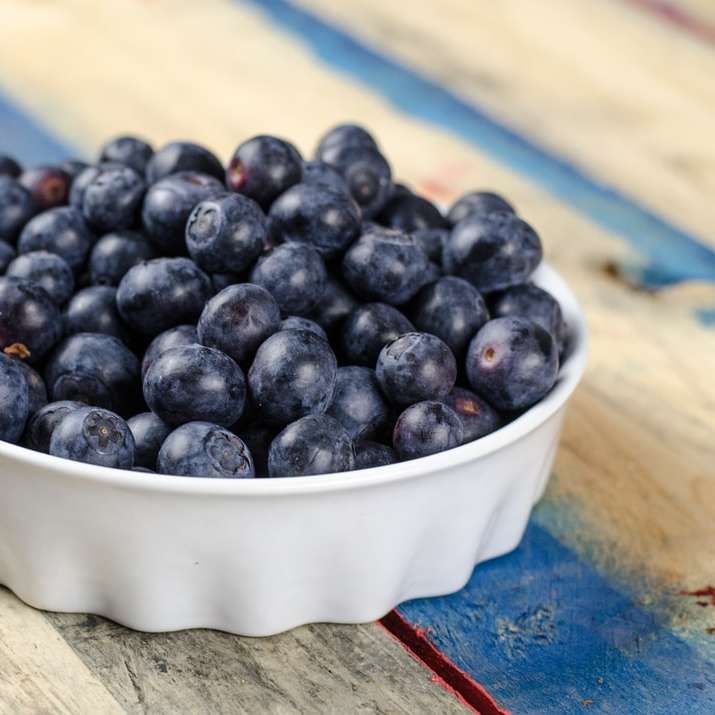 blueberries on white ceramic bowl sliding puzzle online
