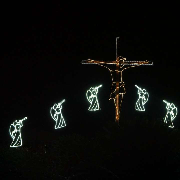 crucifixo e luzes de anjo puzzle deslizante online