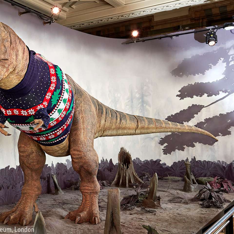 Dinosauro T-Rex che indossa un maglione natalizio puzzle online